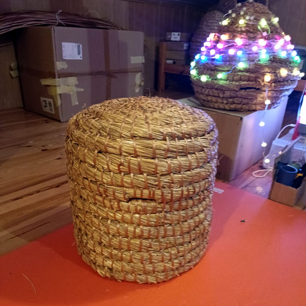 Hand made sraw hive. Skep from natural materials